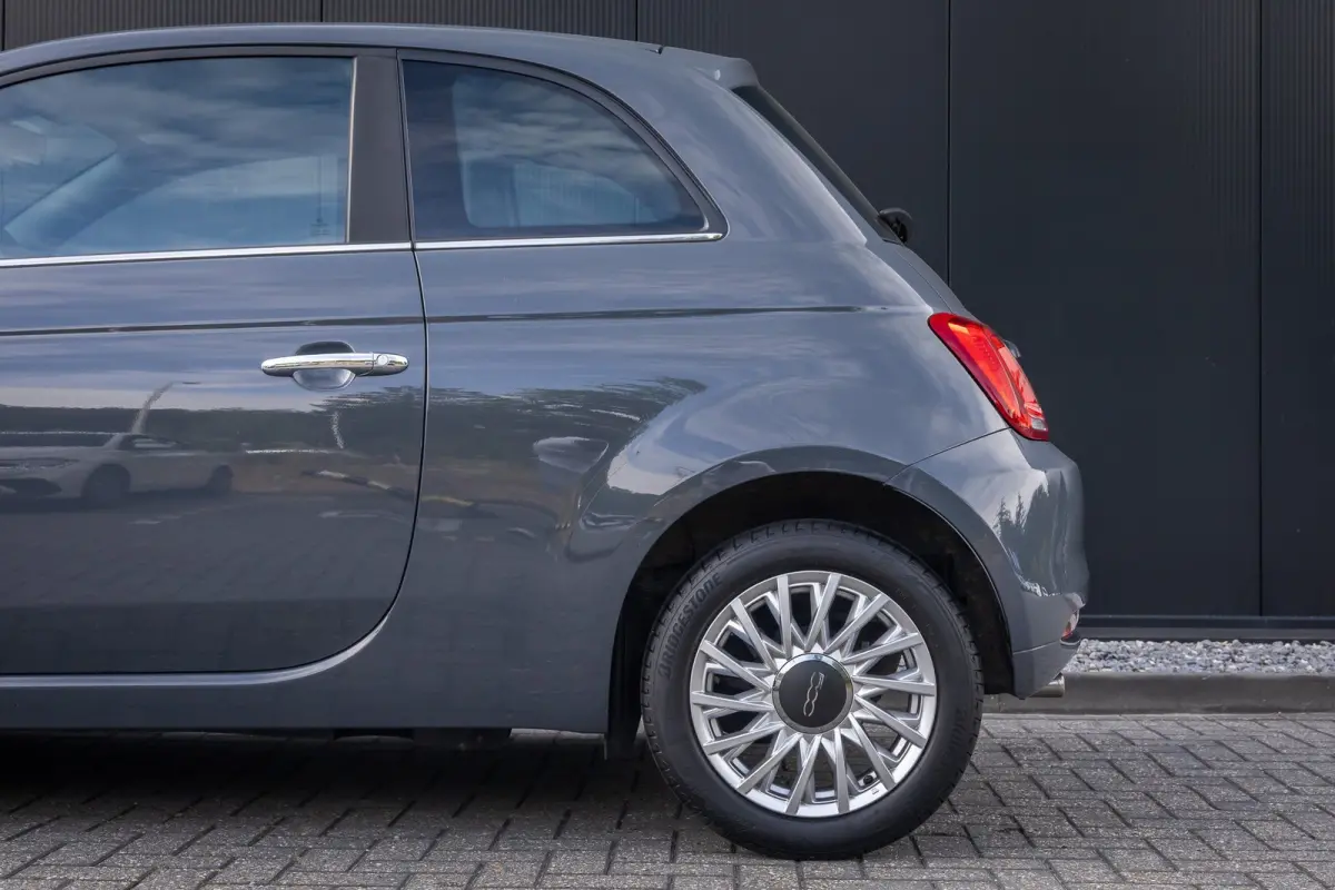 1.0 Hybrid Dolcevita | Panoramadak | Cruise control | Bluetooth | Half leder