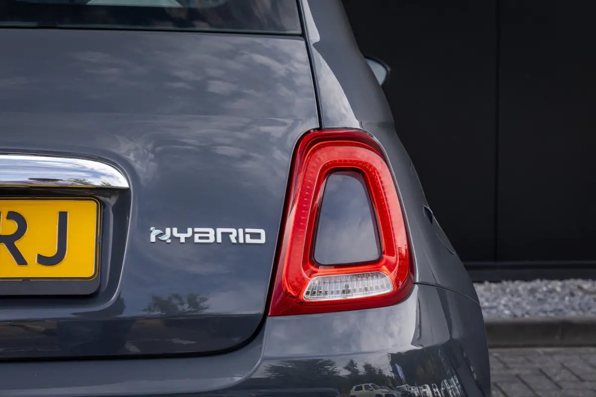 1.0 Hybrid Dolcevita | Panoramadak | Cruise control | Bluetooth | Half leder