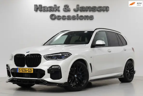 XDrive40i High Executive M-Sport Softclose Luchtvering Panoramadak Skylounge Keyless Massage Trekhaak Crystal H/K Headup
