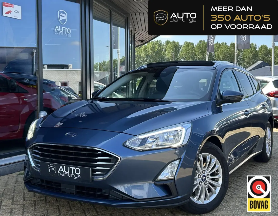 1.0 EcoBoost Titanium Business 125PK | PANO | 2e Eigenaar | NL AUTO | Onderhoudshistorie | NAP | Elektrische Achterklep | Parkeersensoren | Winter Pack | Stoel Stuur en Voorruitverwarming | 