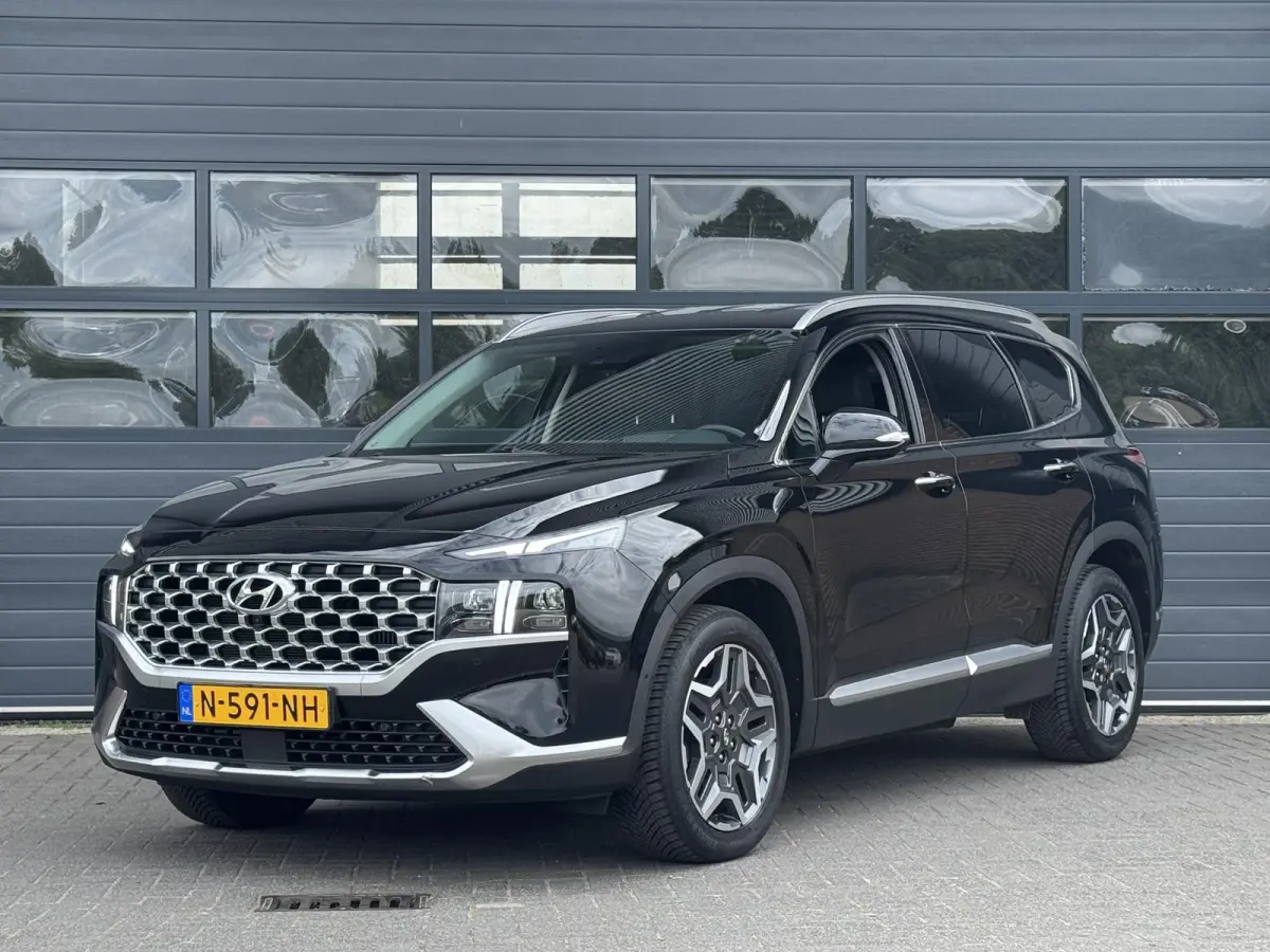 1.6 T-GDI PHEV PREMIUM 7-PERS I AUTOMAAT I P-CAMERA I LEDEREN BEKLEDING I STOELVERWARMING