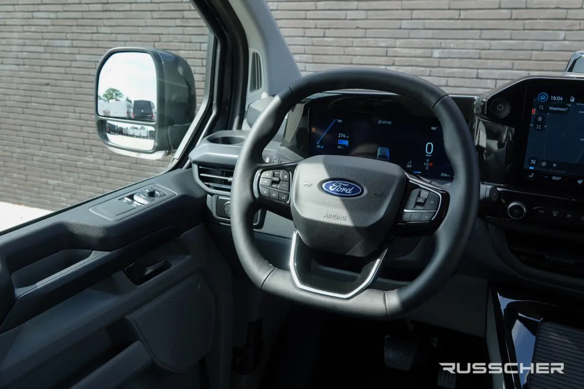 E-Transit L2H1 218Pk Aut. | | Nieuwe 71kWh Accu | 5-Persoons | Elektrisch | Sport 320 | 360° Camera | 19''