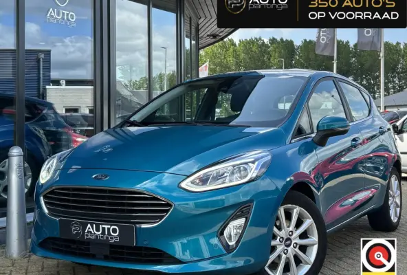 1.0 EcoBoost Titanium 101PK | LUXE | Achteruitrijcamera | B&O Audio | Climate Control | Navigatie | Adaptive Cruise Control | Voorruitverwarming | Parkeersensoren Voor en Achter | Lichtmetal