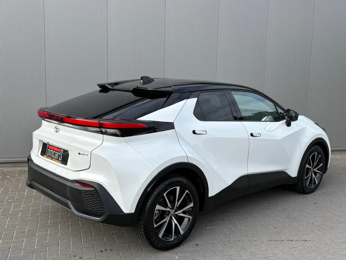 1.8 Hybrid 140PK First Edition Bi-Tone/Winter-pack/Gr.-navigatie/Elektr.klep/Camera/Adapt.-cruise