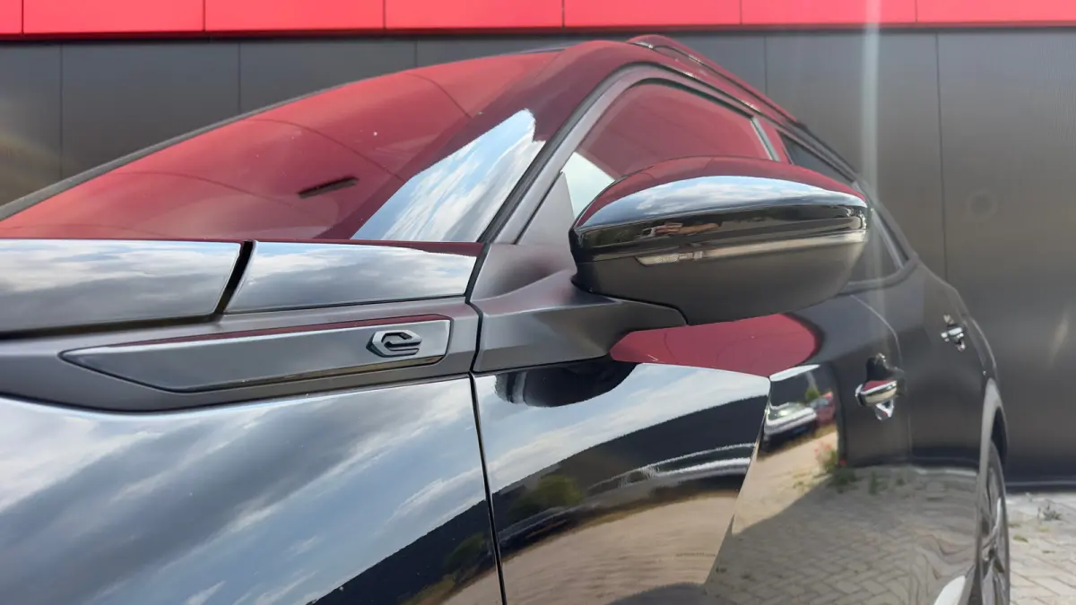 EV GT Pack 50 kWh | Panorama Dak | Stoelverwarming Voor | Adaptieve Cruise Control | Achteruitrijd Camera | Adaptieve Lane Assist | Keyless Entry | Achteruitrijcamera | Cruise control adapti