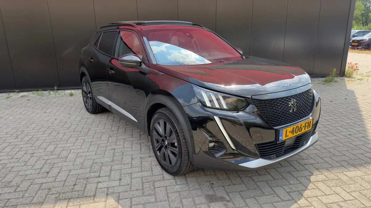EV GT Pack 50 kWh | Panorama Dak | Stoelverwarming Voor | Adaptieve Cruise Control | Achteruitrijd Camera | Adaptieve Lane Assist | Keyless Entry | Achteruitrijcamera | Cruise control adapti