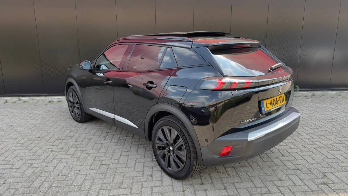 EV GT Pack 50 kWh | Panorama Dak | Stoelverwarming Voor | Adaptieve Cruise Control | Achteruitrijd Camera | Adaptieve Lane Assist | Keyless Entry | Achteruitrijcamera | Cruise control adapti