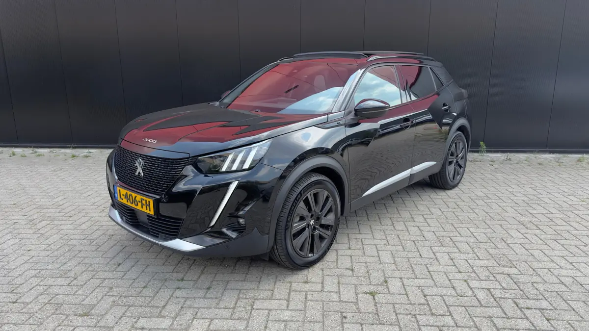 EV GT Pack 50 kWh | Panorama Dak | Stoelverwarming Voor | Adaptieve Cruise Control | Achteruitrijd Camera | Adaptieve Lane Assist | Keyless Entry | Achteruitrijcamera | Cruise control adapti