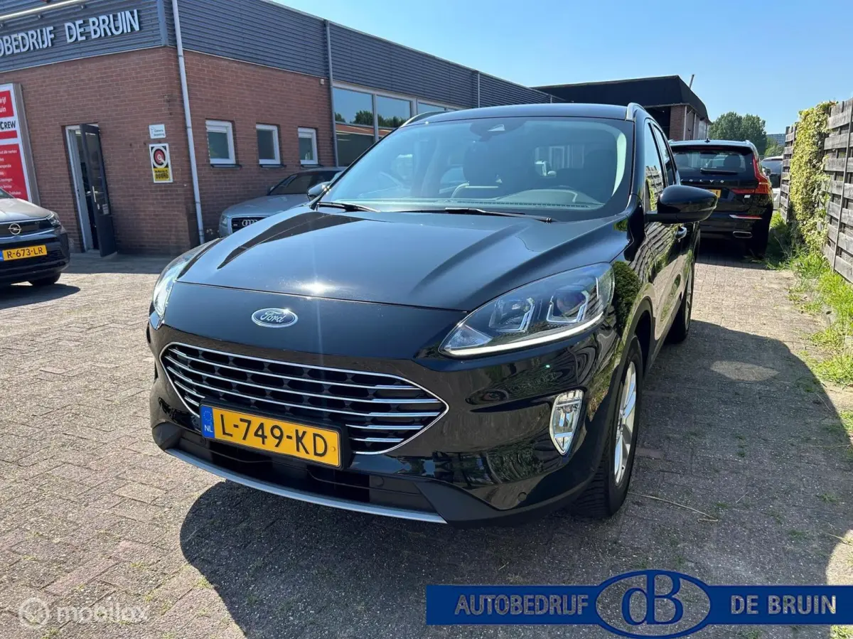 2.5 PHEV Titanium Leer