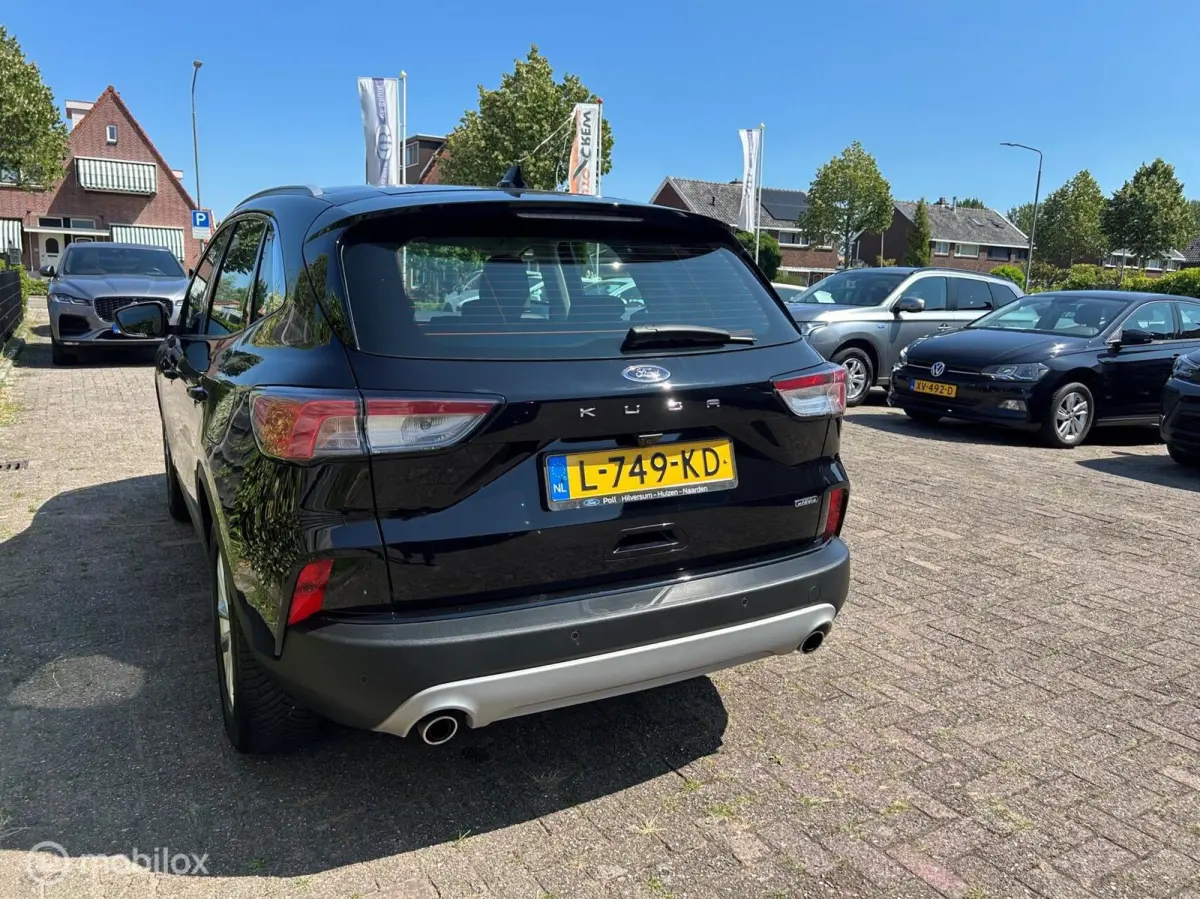 2.5 PHEV Titanium Leer