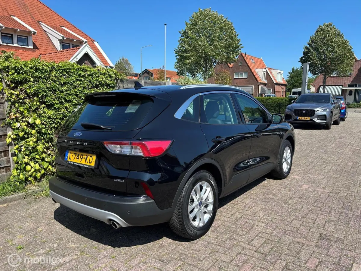 2.5 PHEV Titanium Leer