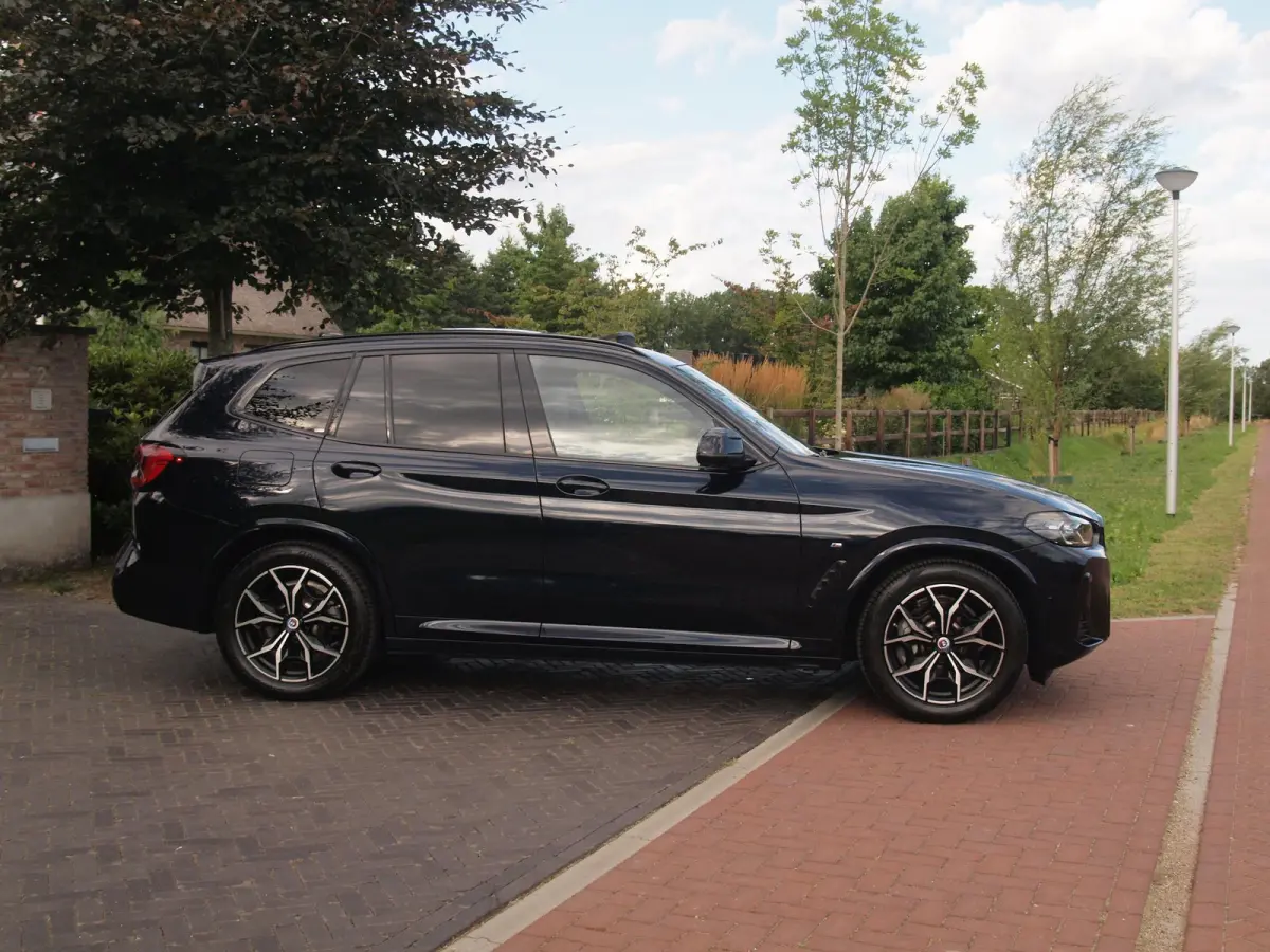 Executive 80 kWh | Facelift Model | Shadow Line | Panoramadak | Camera | Sfeerverlichting | NL-Auto |