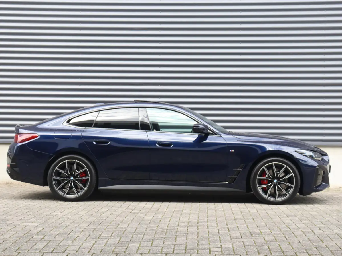 xDrive40 | M Sportpakket Pro | Panodak | Trekhaak | Elektr. Stoelen | Head-Up | Parking Assistant Plus | Adaptive Cruise Control | Harman Kardon | SOH 100% | 19'' LMV