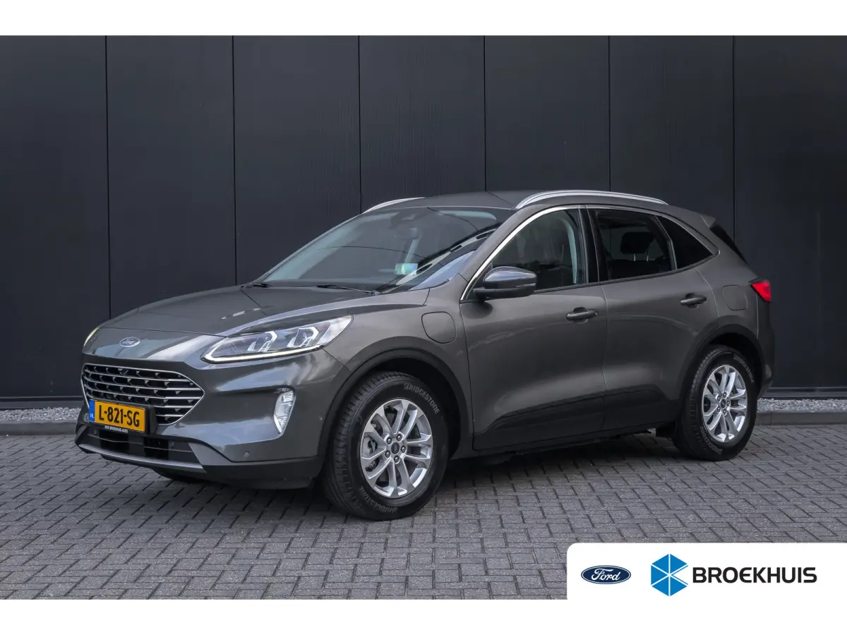 2.5 PHEV Titanium | 100% dealer o.h. | Trekhaak | Adaptieve cruise | Standkachel | Parkeercamera | Apple carplay / andriod auto
