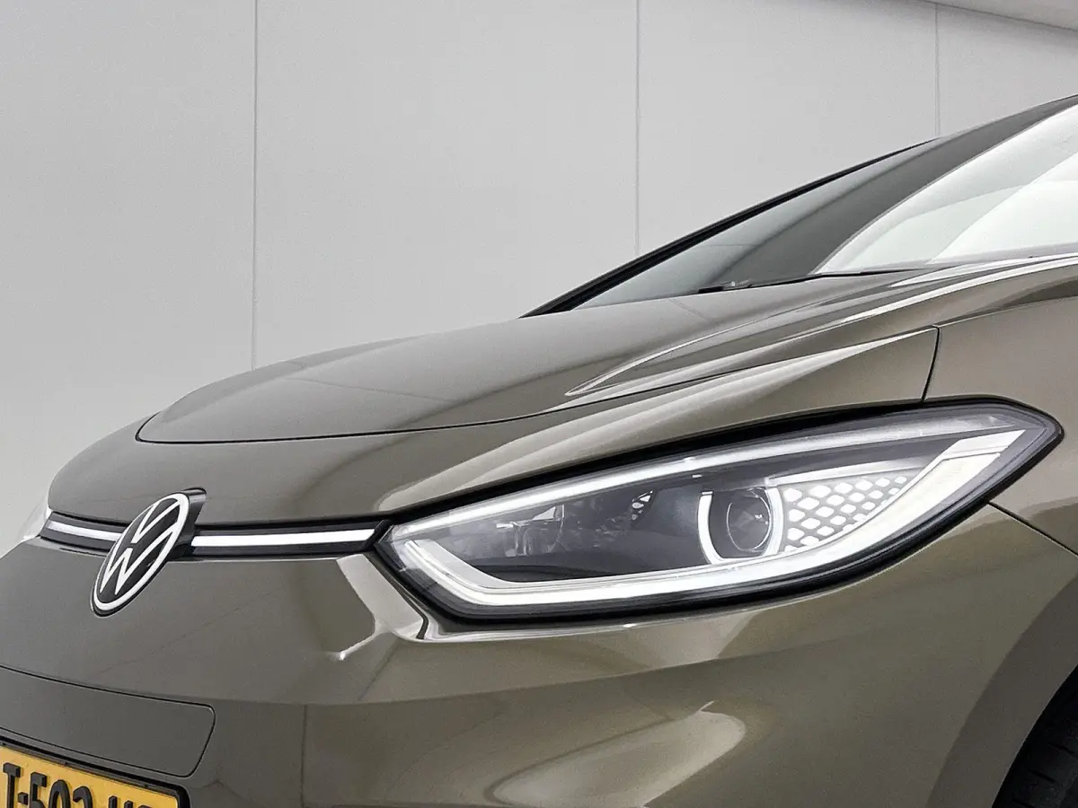 Pro Business 59 kWh | SoH 91% | Olive Green | Keyless | Parkeercamera | Stoelverwarming | Navigatie | Carplay / Android Auto