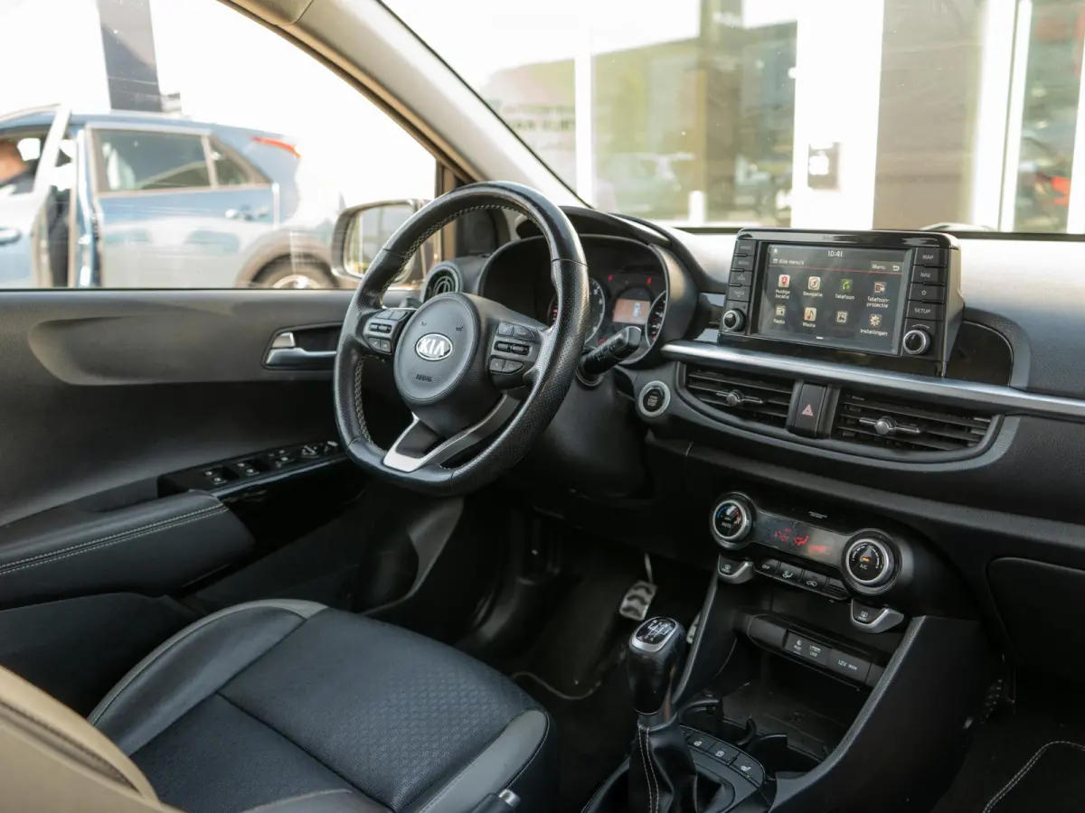 1.0 T-GDI X-Line | 100PK | Stoel en stuurverwarming | Navigatie | Climate control |