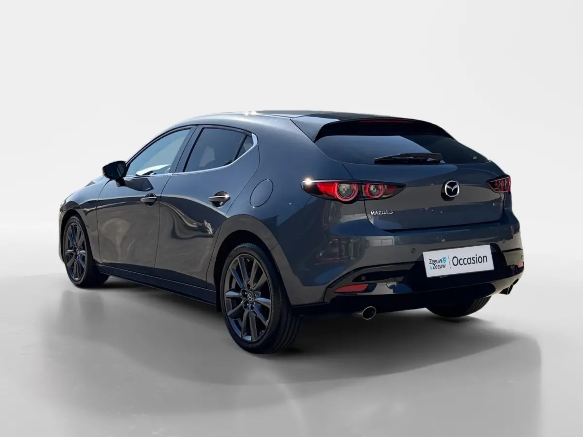 2.0 e-SkyActiv-G M Hybrid 122 Comfort met Bose | Apple Carplay / Android Auto | Navigatiesysteem | Licht + Regensensor | Elektrisch Verstelbare Bestuurderstoel  | Stoel + Stuurverwarming | P
