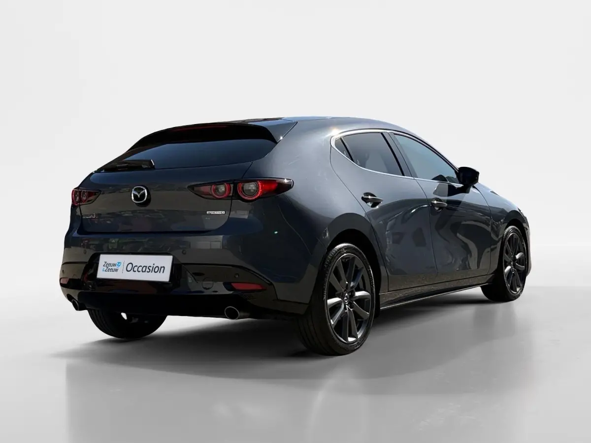 2.0 e-SkyActiv-G M Hybrid 122 Comfort met Bose | Apple Carplay / Android Auto | Navigatiesysteem | Licht + Regensensor | Elektrisch Verstelbare Bestuurderstoel  | Stoel + Stuurverwarming | P