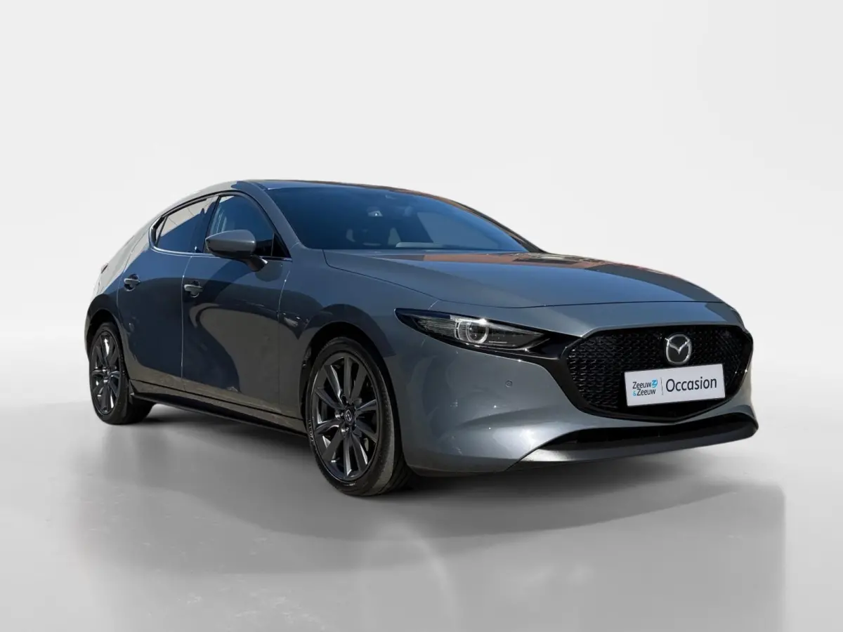 2.0 e-SkyActiv-G M Hybrid 122 Comfort met Bose | Apple Carplay / Android Auto | Navigatiesysteem | Licht + Regensensor | Elektrisch Verstelbare Bestuurderstoel  | Stoel + Stuurverwarming | P