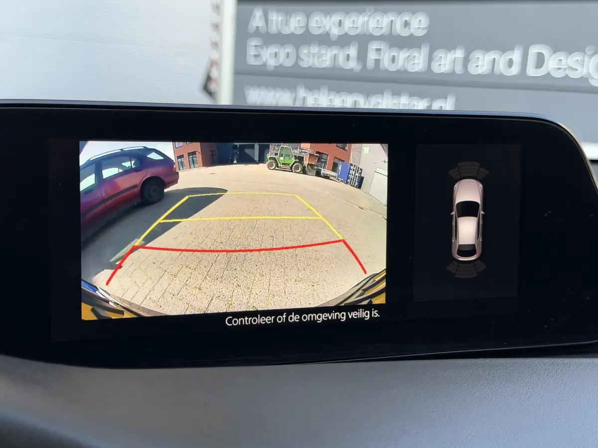 2.0 e-SkyActiv-G M Hybrid 122 Comfort met Bose | Apple Carplay / Android Auto | Navigatiesysteem | Licht + Regensensor | Elektrisch Verstelbare Bestuurderstoel  | Stoel + Stuurverwarming | P