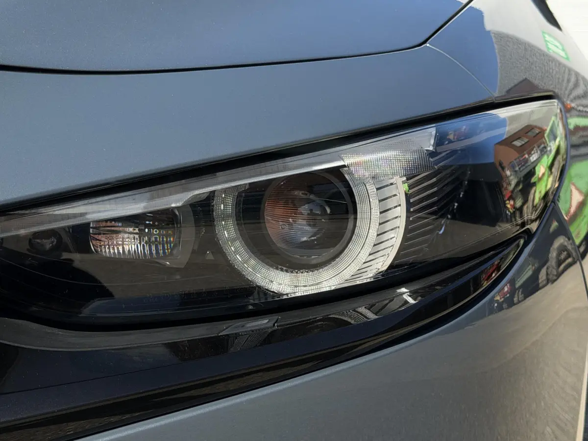 2.0 e-SkyActiv-G M Hybrid 122 Comfort met Bose | Apple Carplay / Android Auto | Navigatiesysteem | Licht + Regensensor | Elektrisch Verstelbare Bestuurderstoel  | Stoel + Stuurverwarming | P