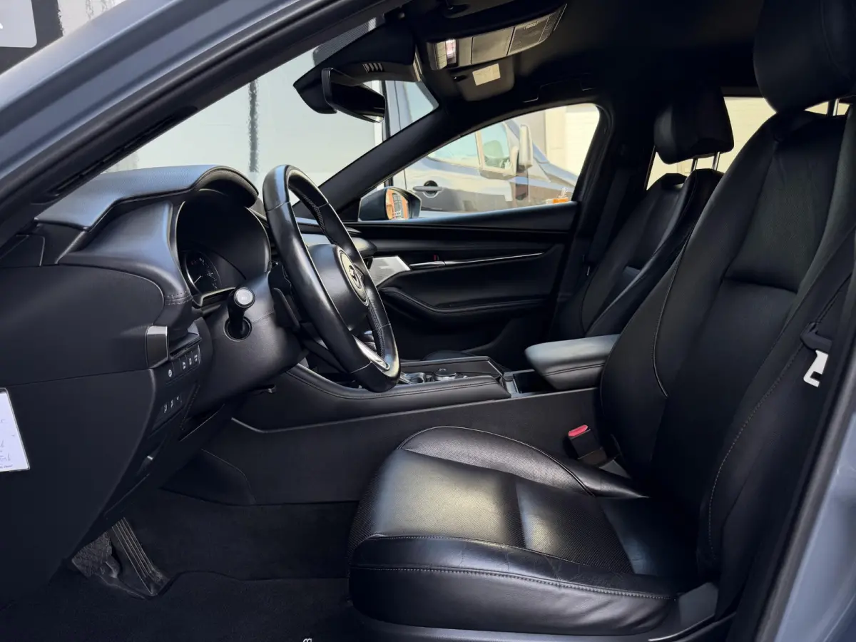 2.0 e-SkyActiv-G M Hybrid 122 Comfort met Bose | Apple Carplay / Android Auto | Navigatiesysteem | Licht + Regensensor | Elektrisch Verstelbare Bestuurderstoel  | Stoel + Stuurverwarming | P