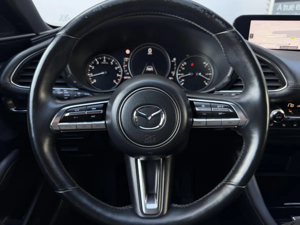 2.0 e-SkyActiv-G M Hybrid 122 Comfort met Bose | Apple Carplay / Android Auto | Navigatiesysteem | Licht + Regensensor | Elektrisch Verstelbare Bestuurderstoel  | Stoel + Stuurverwarming | P