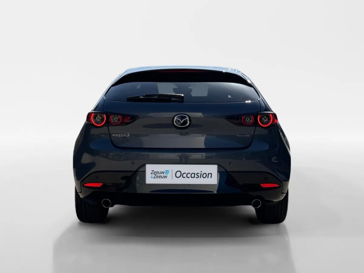 2.0 e-SkyActiv-G M Hybrid 122 Comfort met Bose | Apple Carplay / Android Auto | Navigatiesysteem | Licht + Regensensor | Elektrisch Verstelbare Bestuurderstoel  | Stoel + Stuurverwarming | P