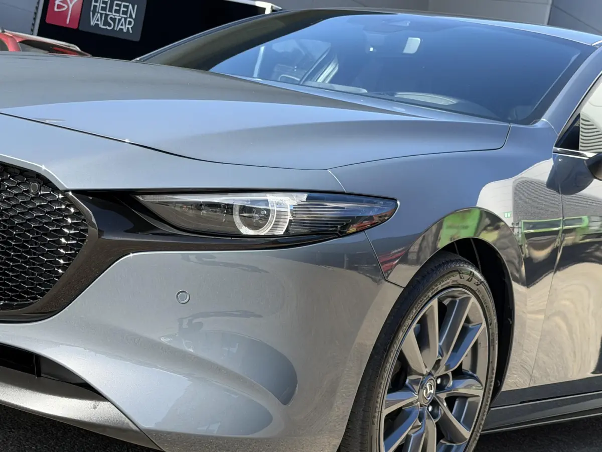 2.0 e-SkyActiv-G M Hybrid 122 Comfort met Bose | Apple Carplay / Android Auto | Navigatiesysteem | Licht + Regensensor | Elektrisch Verstelbare Bestuurderstoel  | Stoel + Stuurverwarming | P
