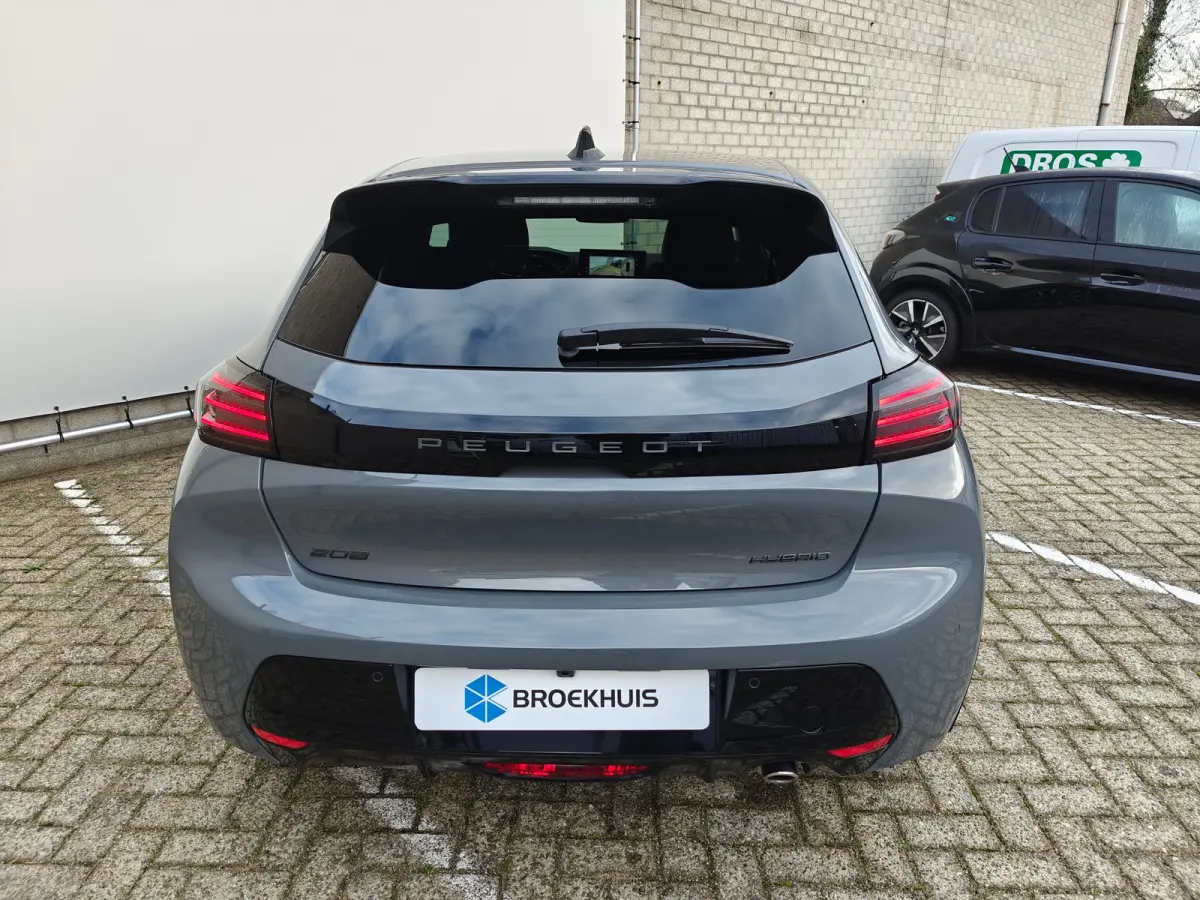 GT | Armsteunen op de voorportieren bekleed met kunstleder met groen sierstiksel (GT-Line) | Climate Control | Dashboard en deurpanelen in kunststof met carboneffect