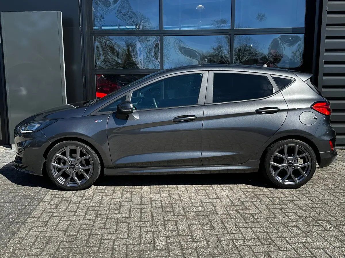 1.0 125 PK Hybrid ST-Line | STUUR, STOEL EN VOORRUITVERWARMING| KEYLESS ENTRY & START| ADAPTIEVE LED KOPLAMPEN| DAB| APPLE CARPLAY/ANDROID AUTO|