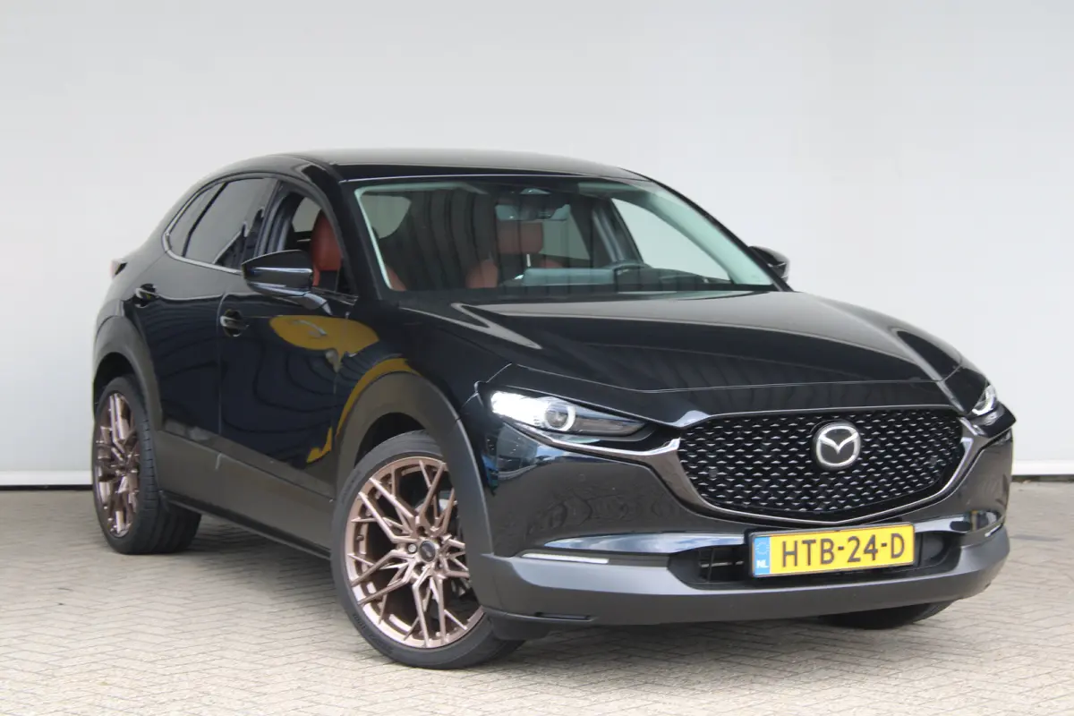 2.0 e-SkyActiv-X M Hybrid Nagisa | Navigatie | Camera | Head-up display | Stoelverwarming | Keyless |