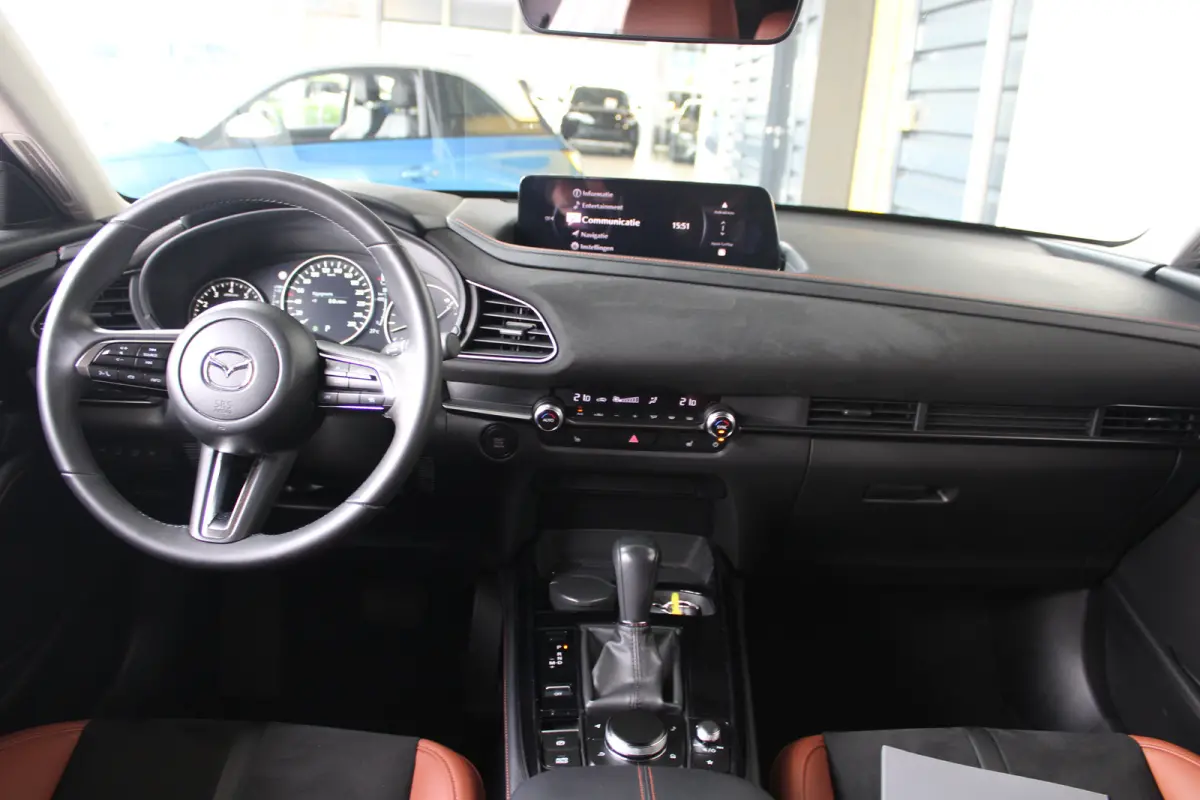2.0 e-SkyActiv-X M Hybrid Nagisa | Navigatie | Camera | Head-up display | Stoelverwarming | Keyless |
