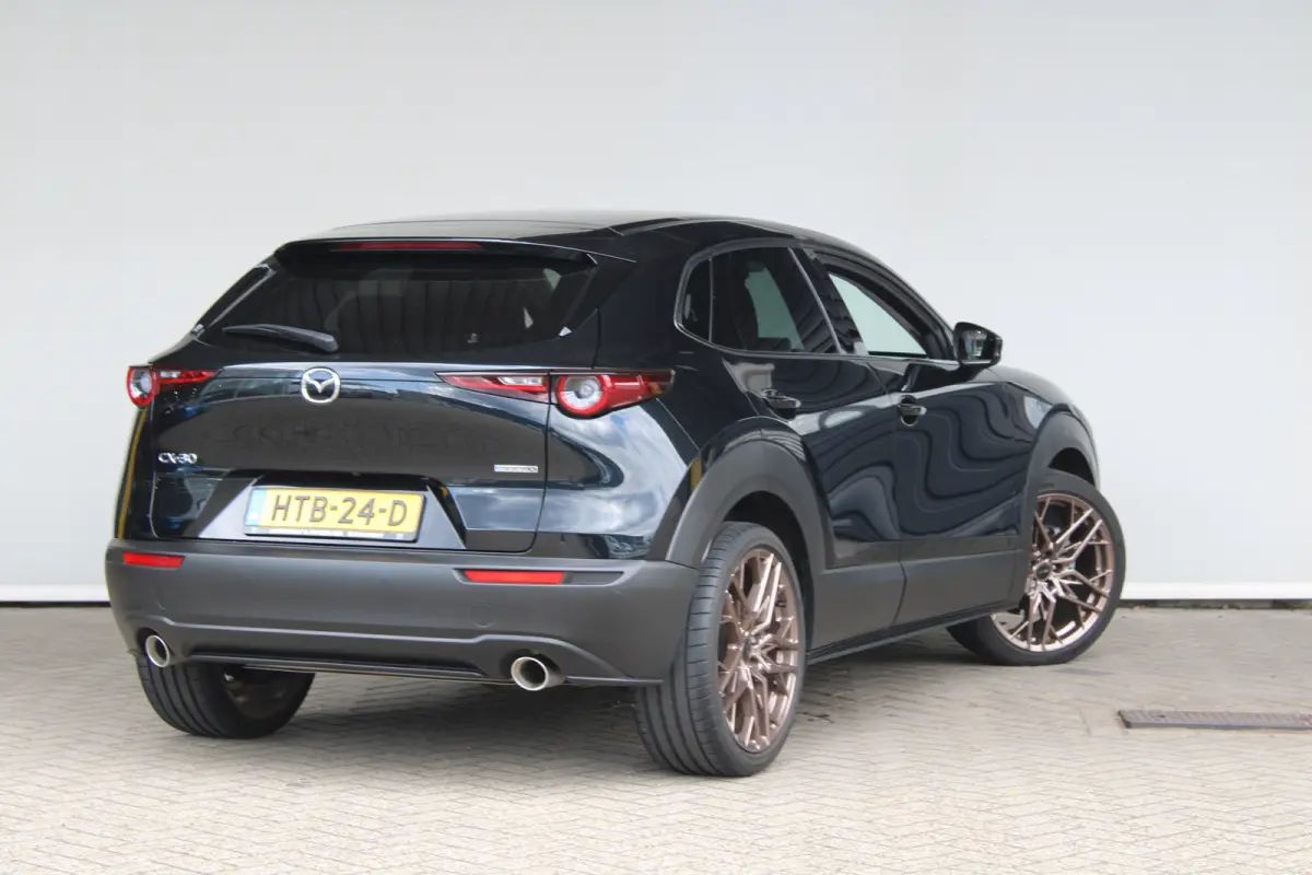 2.0 e-SkyActiv-X M Hybrid Nagisa | Navigatie | Camera | Head-up display | Stoelverwarming | Keyless |
