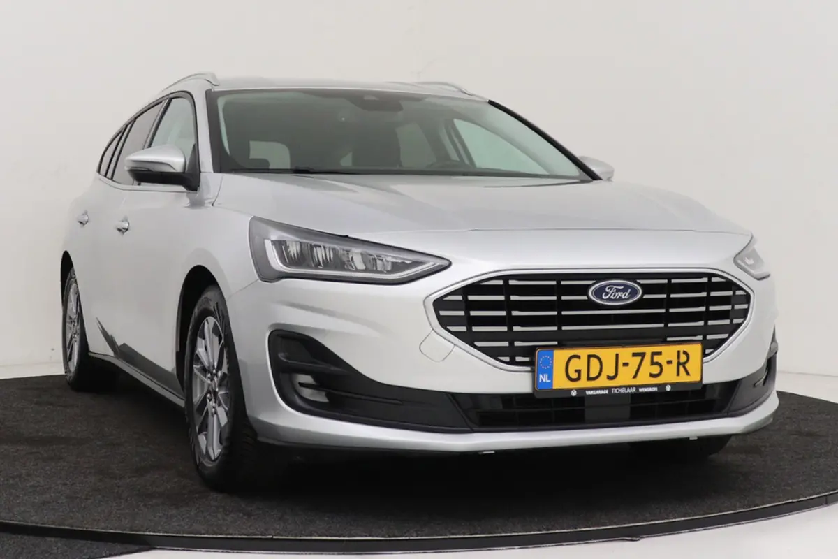 1.0 EcoBoost Hybrid Titanium | Org NL | CarPlay | Cruise Control | Climate Control | PDC | Navigatie | Automaat |