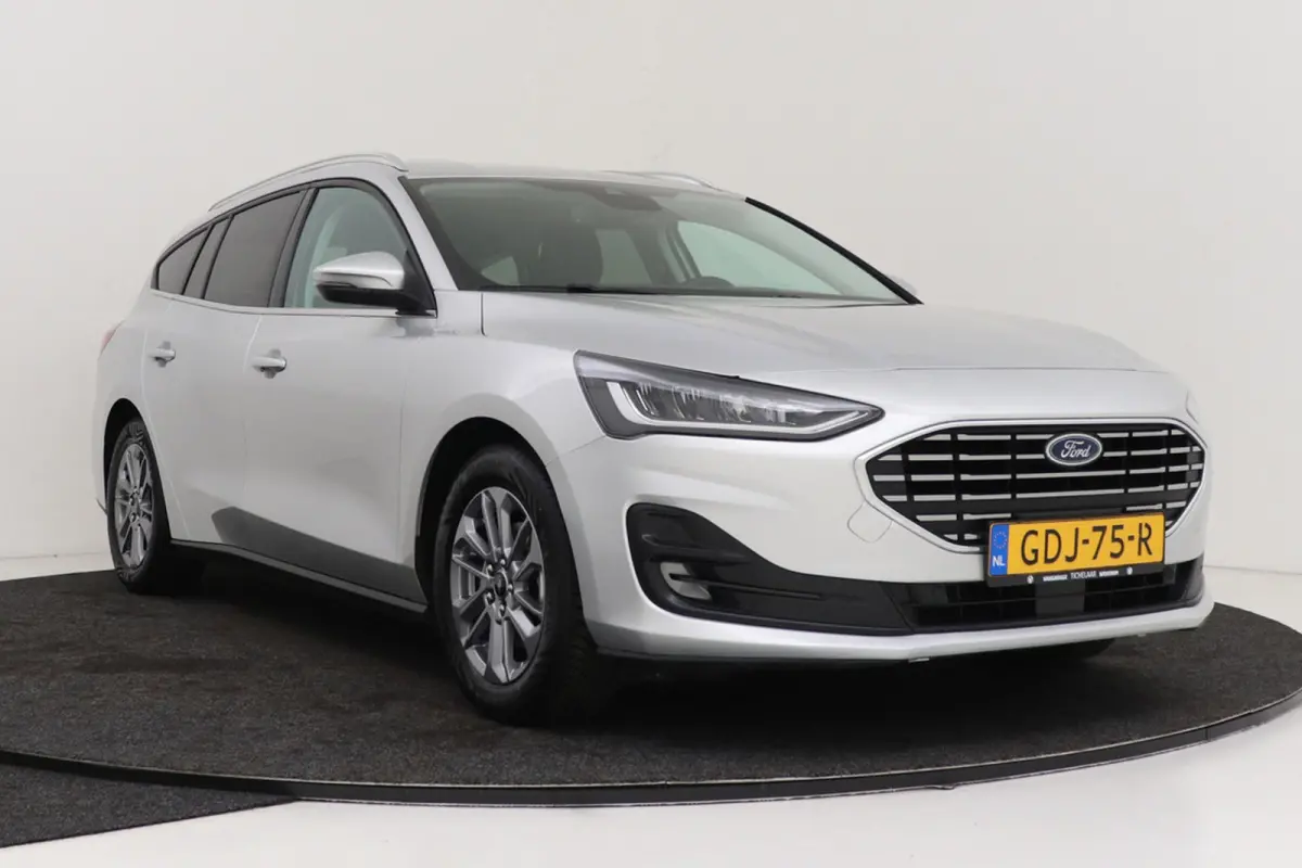 1.0 EcoBoost Hybrid Titanium | Org NL | CarPlay | Cruise Control | Climate Control | PDC | Navigatie | Automaat |