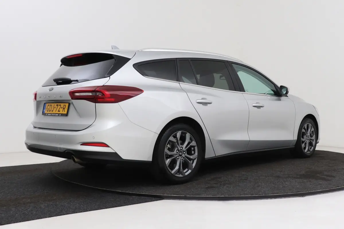 1.0 EcoBoost Hybrid Titanium | Org NL | CarPlay | Cruise Control | Climate Control | PDC | ST-Line Velgen |