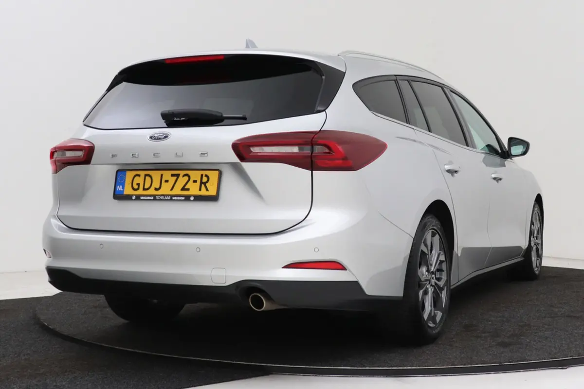 1.0 EcoBoost Hybrid Titanium | Org NL | CarPlay | Cruise Control | Climate Control | PDC | ST-Line Velgen |