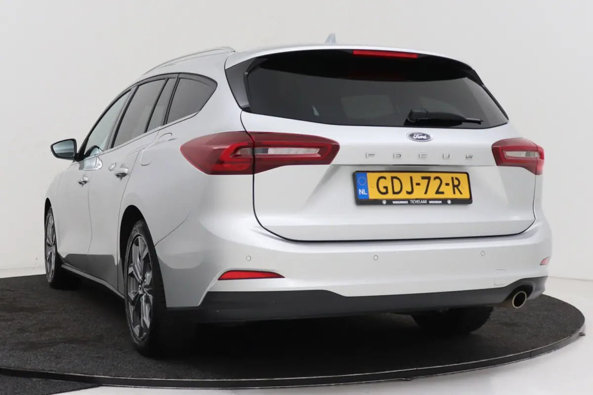 1.0 EcoBoost Hybrid Titanium | Org NL | CarPlay | Cruise Control | Climate Control | PDC | ST-Line Velgen |