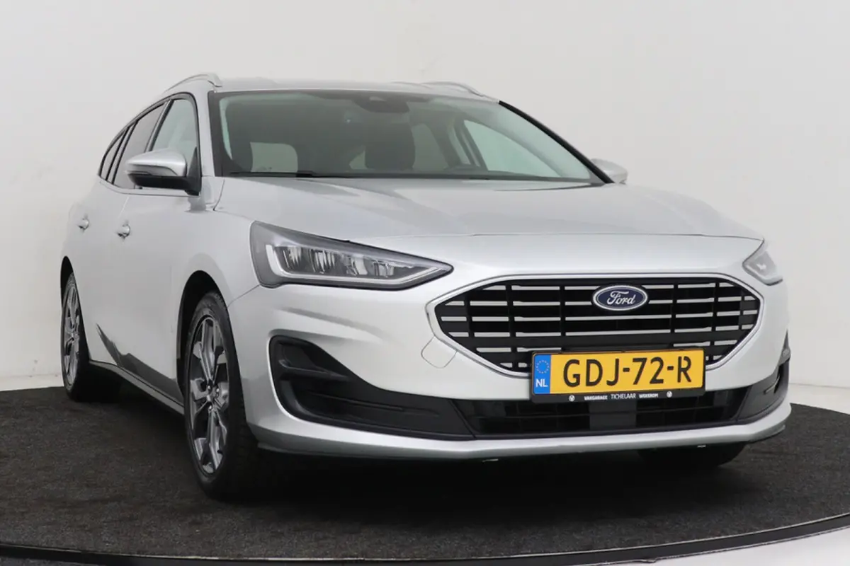 1.0 EcoBoost Hybrid Titanium | Org NL | CarPlay | Cruise Control | Climate Control | PDC | ST-Line Velgen |