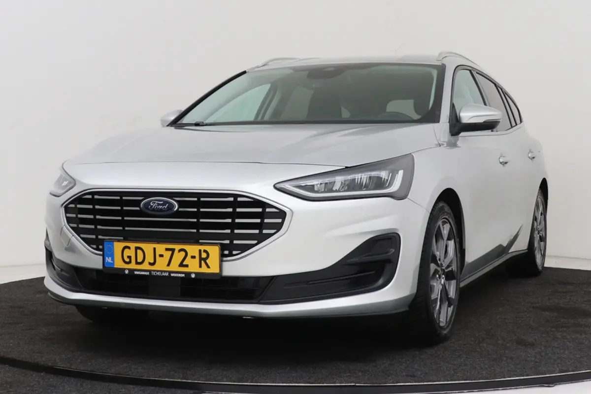 1.0 EcoBoost Hybrid Titanium | Org NL | CarPlay | Cruise Control | Climate Control | PDC | ST-Line Velgen |