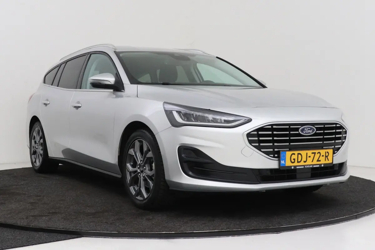 1.0 EcoBoost Hybrid Titanium | Org NL | CarPlay | Cruise Control | Climate Control | PDC | ST-Line Velgen |