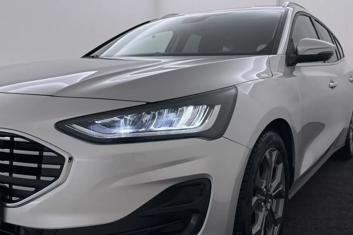 1.0 EcoBoost Hybrid Titanium | Org NL | CarPlay | Cruise Control | Climate Control | PDC | ST-Line Velgen |