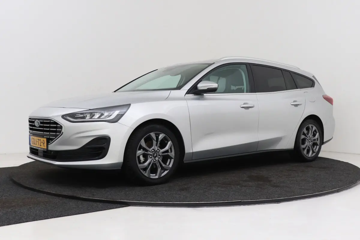1.0 EcoBoost Hybrid Titanium | Org NL | CarPlay | Cruise Control | Climate Control | PDC | ST-Line Velgen |
