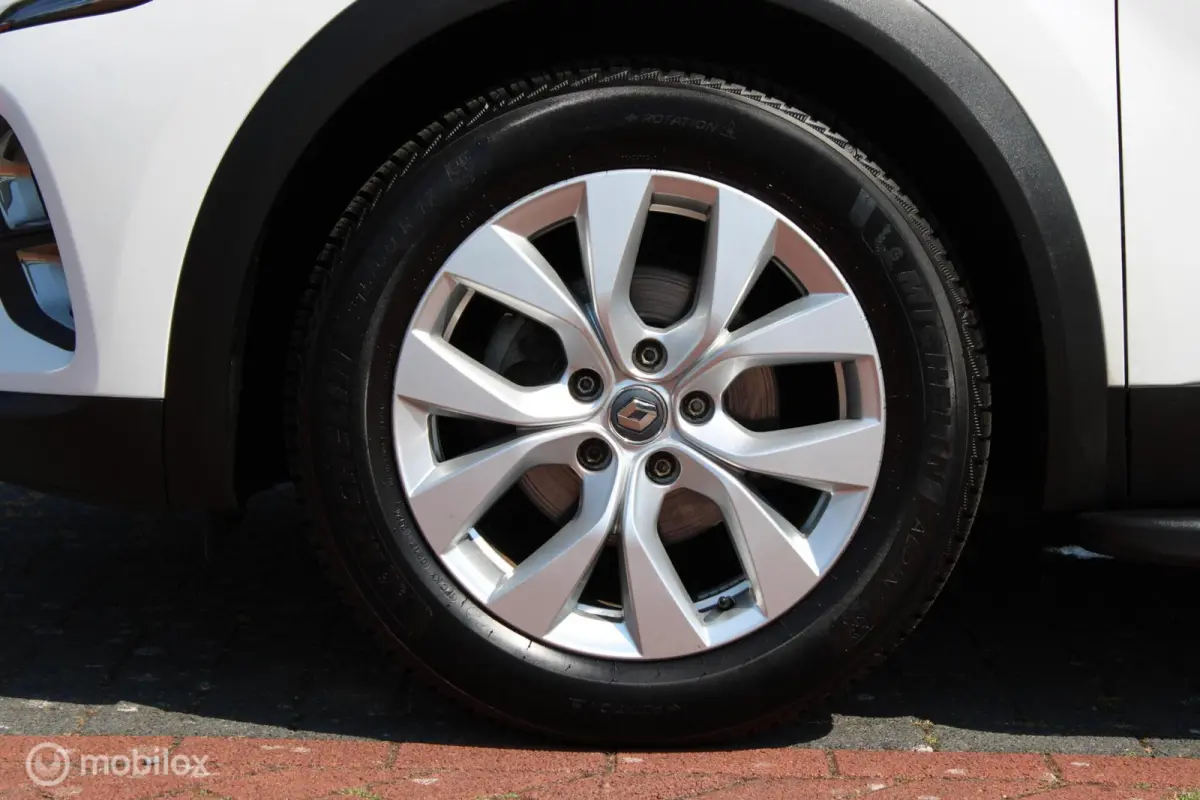 1.0 TCe 90 Intens, Wit metallic, Zwart dak, Donker glas, Navi, Clima, Stoelverwarming, Trekhaak, Pdc voor + achter + camera