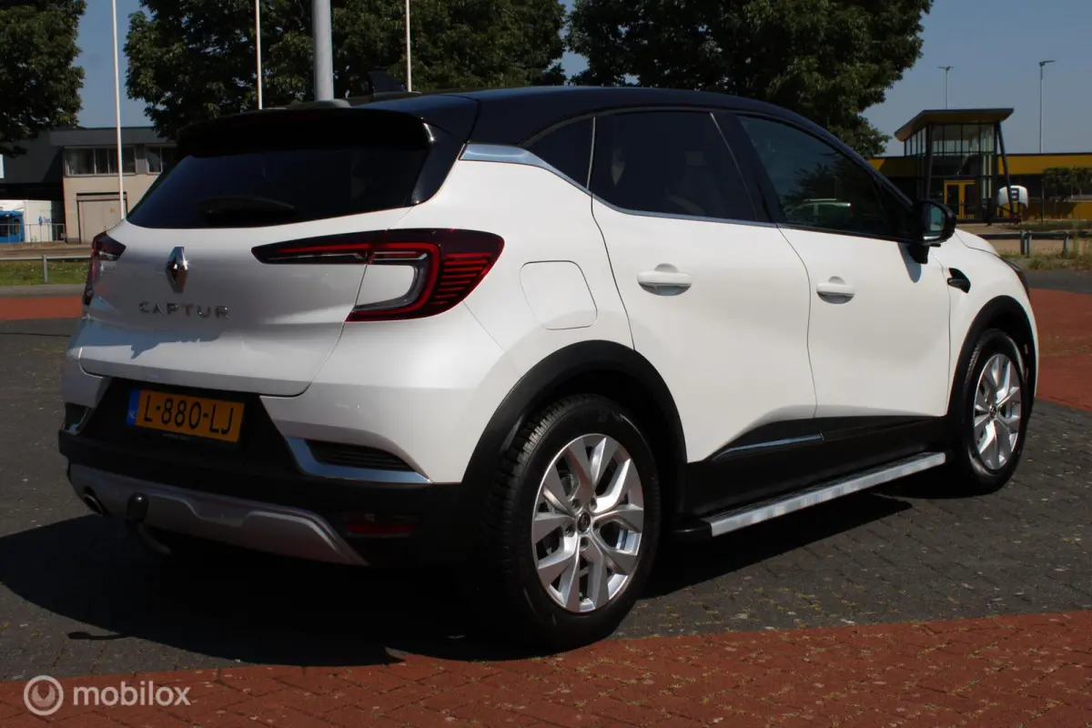 1.0 TCe 90 Intens, Wit metallic, Zwart dak, Donker glas, Navi, Clima, Stoelverwarming, Trekhaak, Pdc voor + achter + camera