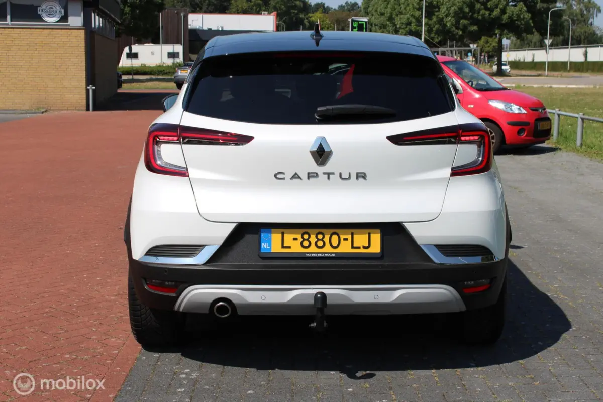 1.0 TCe 90 Intens, Wit metallic, Zwart dak, Donker glas, Navi, Clima, Stoelverwarming, Trekhaak, Pdc voor + achter + camera