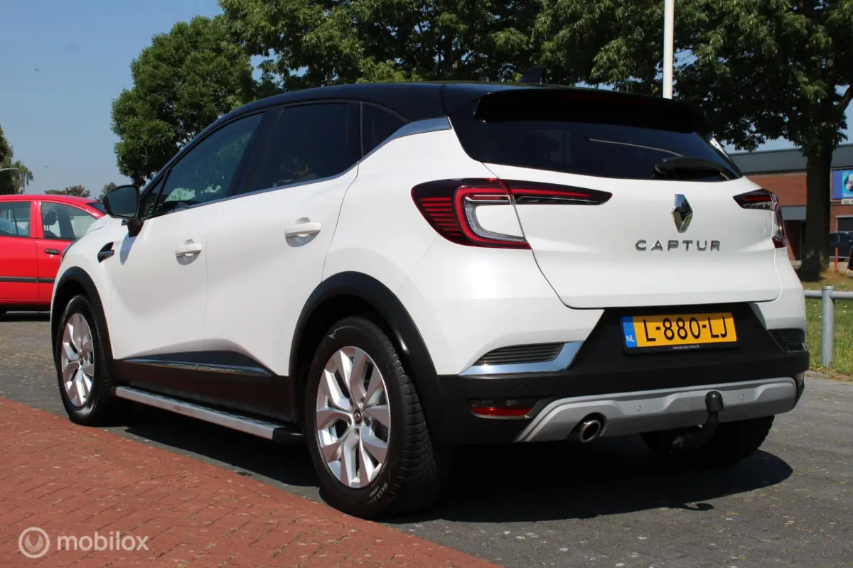1.0 TCe 90 Intens, Wit metallic, Zwart dak, Donker glas, Navi, Clima, Stoelverwarming, Trekhaak, Pdc voor + achter + camera