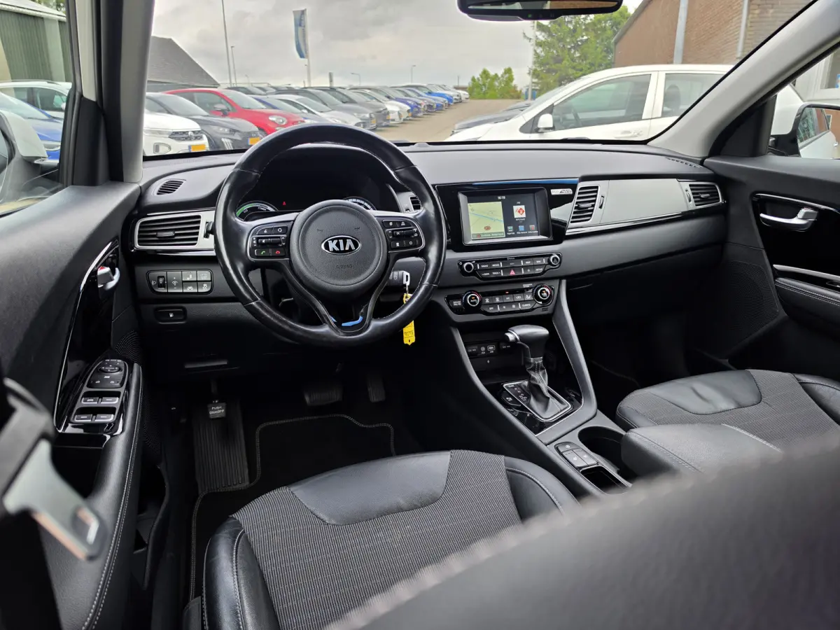 1.6 GDi Hybrid | Ad. cruise control | Navigatie | Half leder | Chroom afwerking | Stoelverwarming