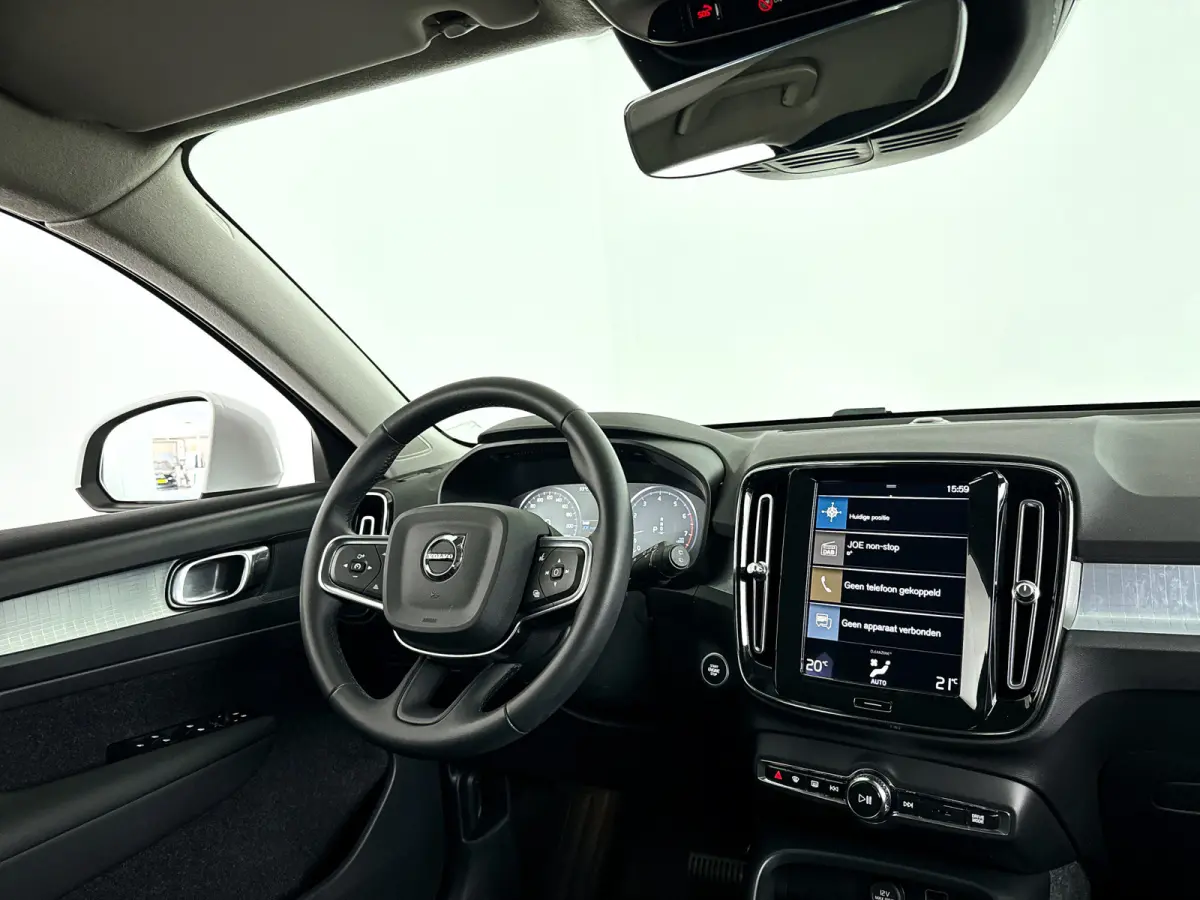 T2 Momentum Business | Parkeercamera | Climate control | Cruise control | Navigatie